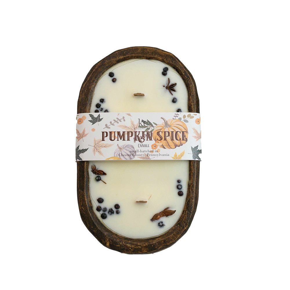 Large table table size Pumpkin Spice soy wax candle from KC Essentials in hand carved walnut brown wood dough bowl . Great for display for Thanksgiving or holiday decorating.