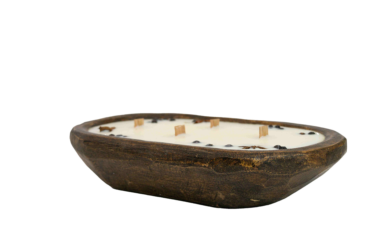 Side view of Large table table size Pumpkin Spice soy wax candle from KC Essentials in hand carved walnut brown wood dough bowl . Great for display for Thanksgiving or holiday decorating.