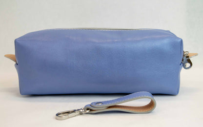Back view of T5 bath dopp kit toiletry wash bag designer handcrafted of smooth calf leather in light Periwinkle blue.