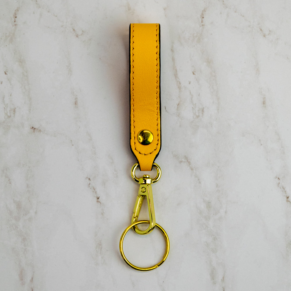 T5 Key chain strap handcrafted by designer Liv McClintock in smooth calf leather in saffron yellow.
