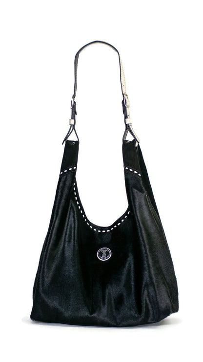 Front of Leather hobo shoulder bag in jet black hair calf &amp; suede. Handcrafted by slow fashion indie designer Liv McClintock. Features hand laced white leather trim. Made in Wilmington Delaware USA.