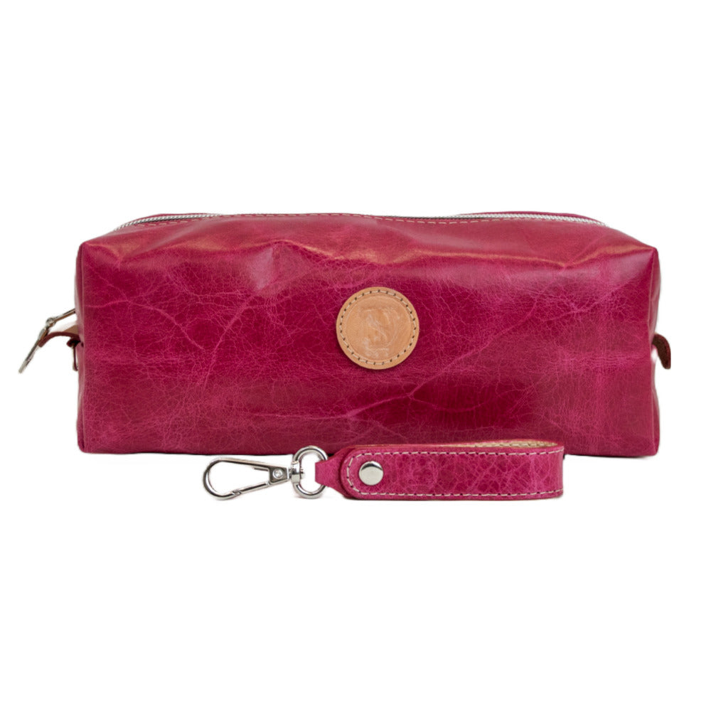 Front view of T5 bath dopp kit toiletry wash bag designer handcrafted of smooth calf leather in hot Barbie pink.