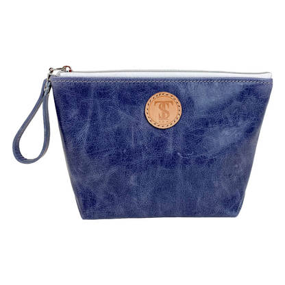 Front view T5 Cosmetics case toiletry bag designer handcrafted in smooth calf leather in denim blue.