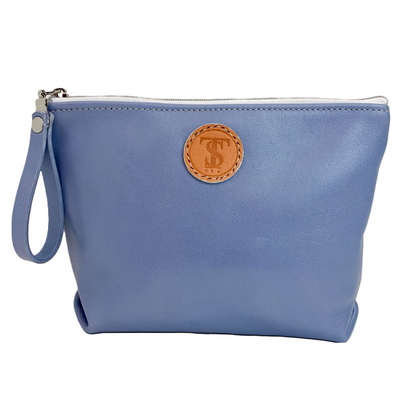 Front view T5 Cosmetics case toiletry bag designer handcrafted in smooth calf leather in light periwinkle blue.