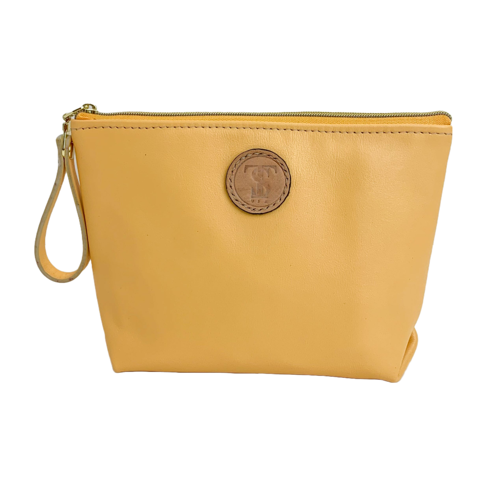Front view T5 Cosmetics case toiletry bag designer handcrafted in smooth calf leather in saffron yellow.
