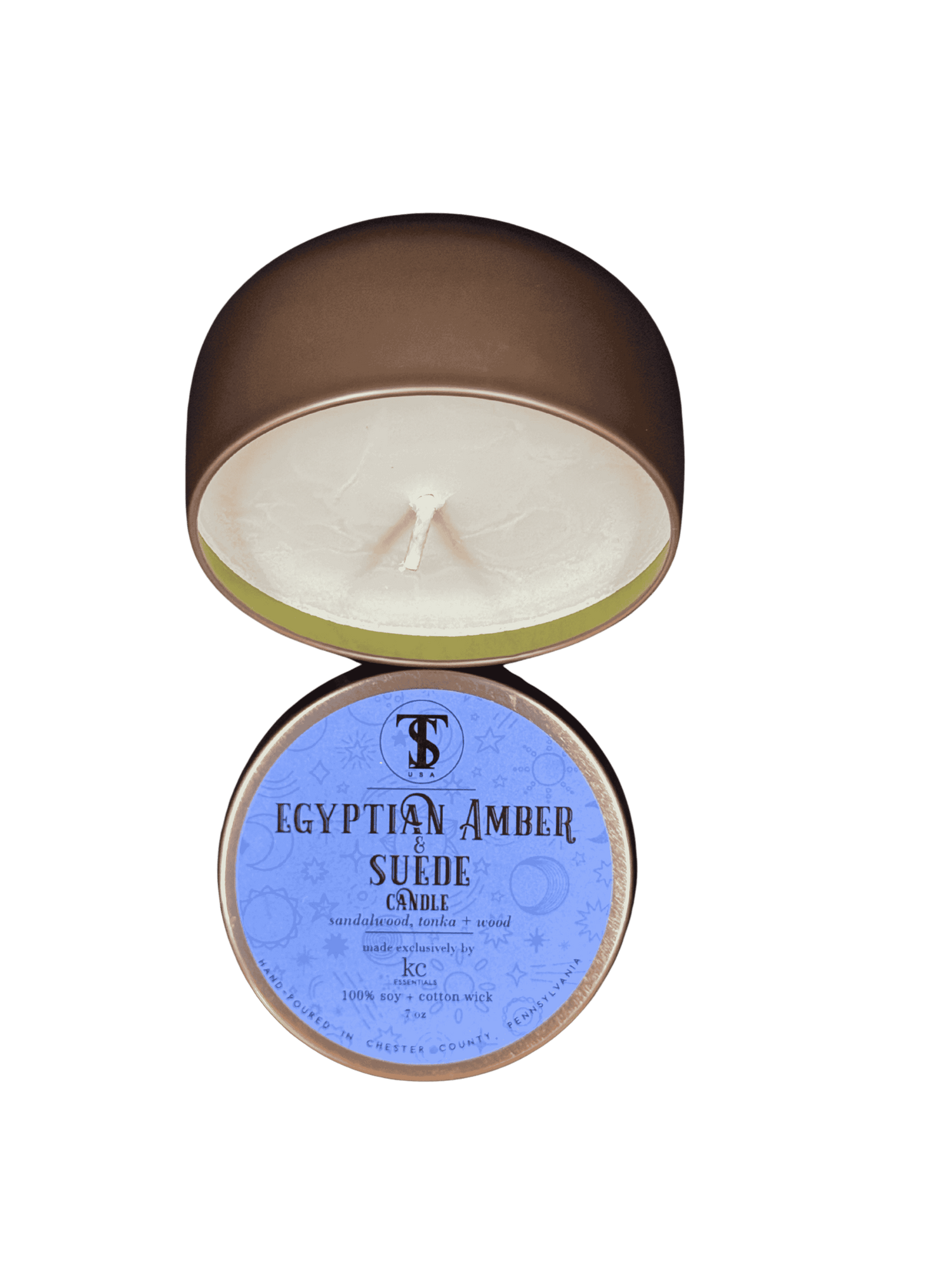 Side view of Town &amp; Shore Handcrafted  Egyptian Amber &amp; Suede Candle  open with Bronze Metal Tin and the Lid on the side. Photo property of Town &amp; Shore Apparel, All rights reserved