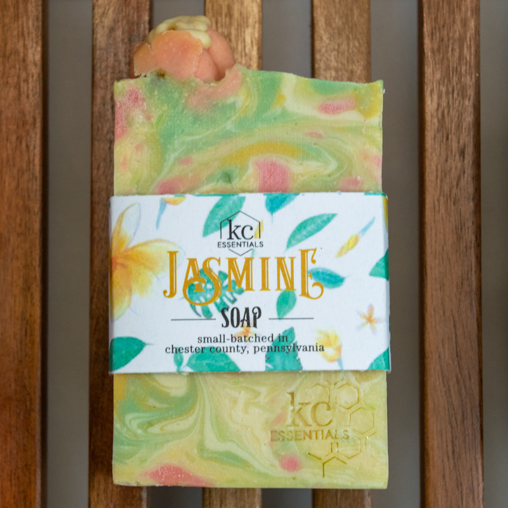 Swirls of yellow, green and orange in the marbled artisan soap bar.