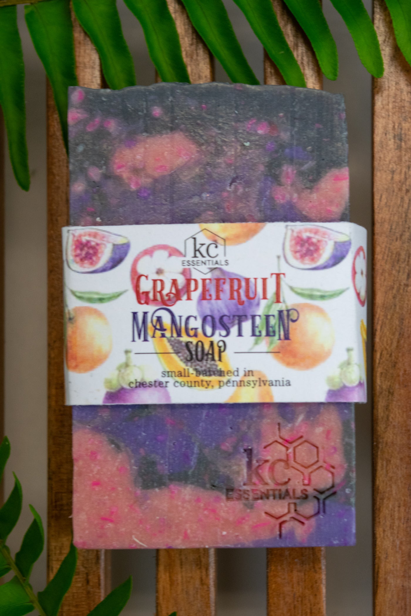 A meddly of colors in pink, purple and blue create the artisanal bar soap.