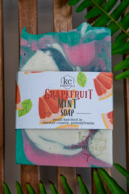 Swirls of color in green, white and pink grace this artisinal bar soap.