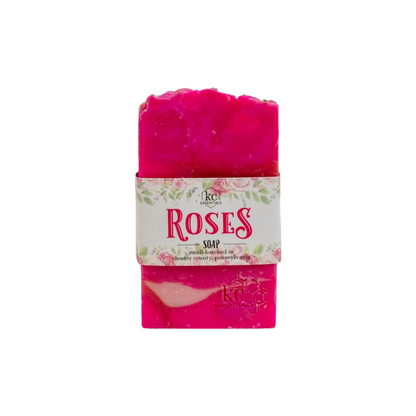 Deep shades of pink and magenta swirl together in the artisan soap bar.