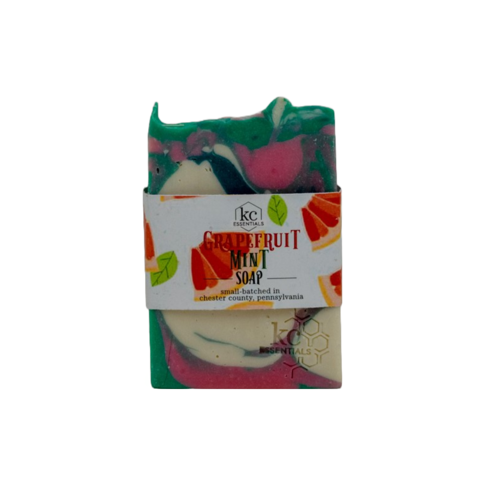 Swirls of color in green, white and pink grace this artisinal bar soap.