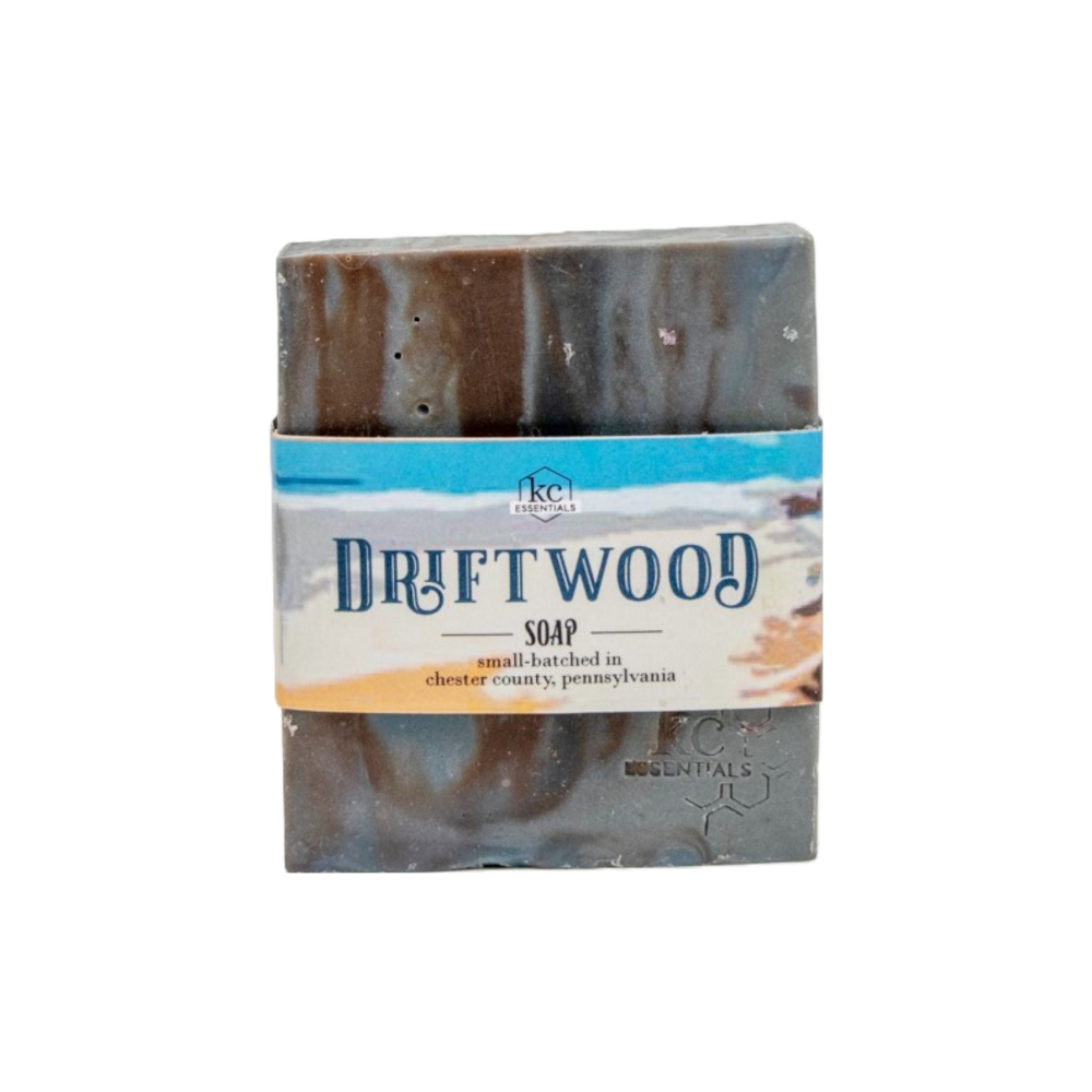 Driftwood - KC Essentials Vegan bar soap in a invigorating scent. Unpackaged soap has streaks of brown and shades of grey form this artisanal soap bar . Subtle masculine fragrance.