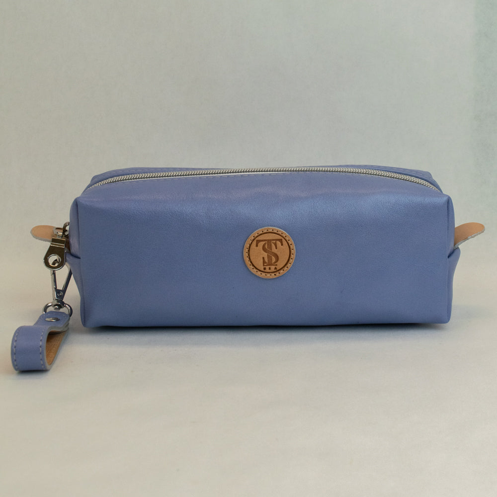 Front view of T5 bath dopp kit toiletry wash bag designer handcrafted of smooth calf leather in light Periwinkle blue.