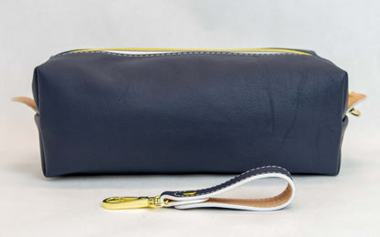 Back view of T5 bath dopp kit toiletry wash bag designer handcrafted of smooth calf leather in nautical navy blue.