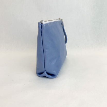 Side view T5 Cosmetics case toiletry bag designer handcrafted in smooth calf leather in light periwinkle blue.