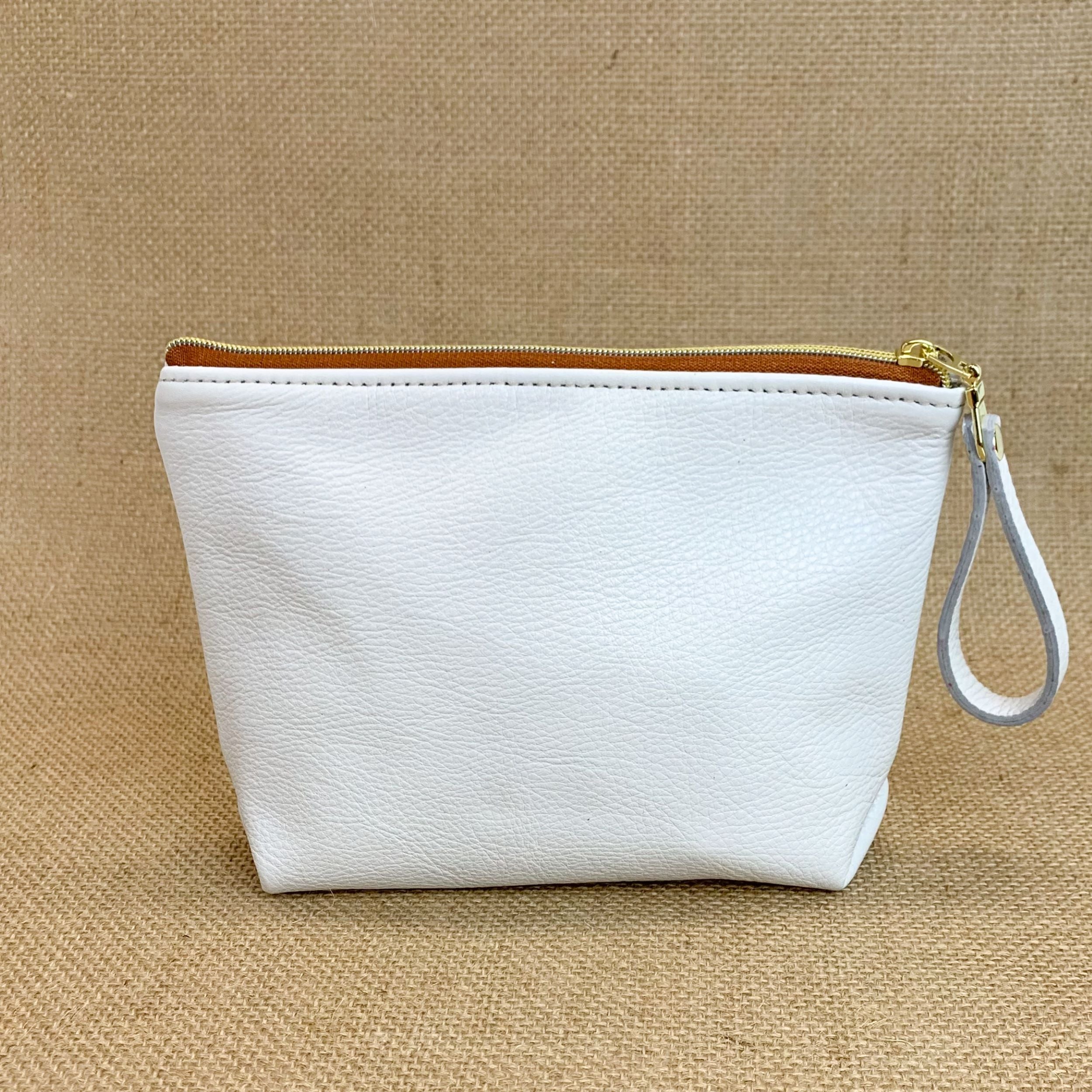 Back view T5 Cosmetics case toiletry bag designer handcrafted in smooth calf leather in yacht white..