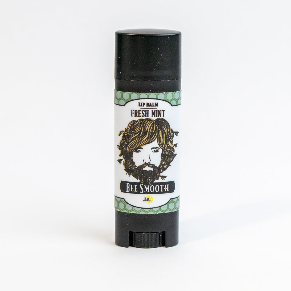 Bee Smooth fresh mint lip balm in black stick container. Natural essential oils. Handmade in USA.