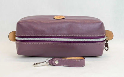 Top view of T5 bath dopp kit toiletry wash bag designer handcrafted of smooth calf leather in Lavender purple.