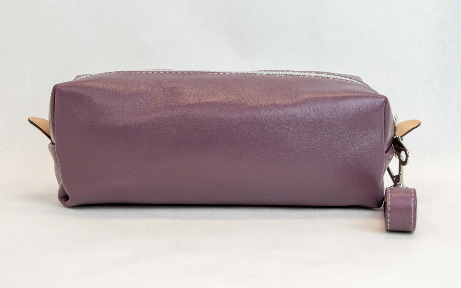 Back view of T5 bath dopp kit toiletry wash bag designer handcrafted of smooth calf leather in Lavender purple.