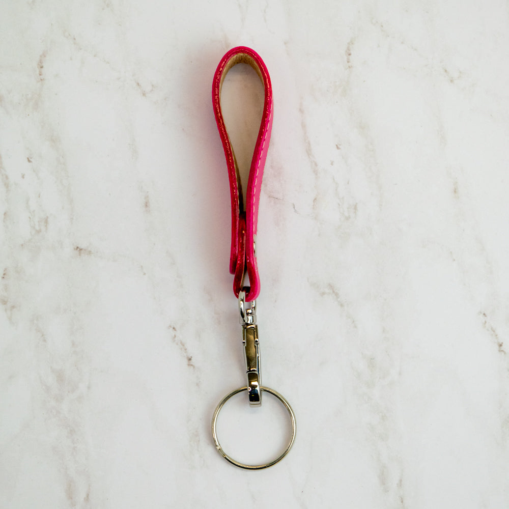 T5 Key chain strap handcrafted by designer Liv McClintock in smooth calf leather in light frosted pink.