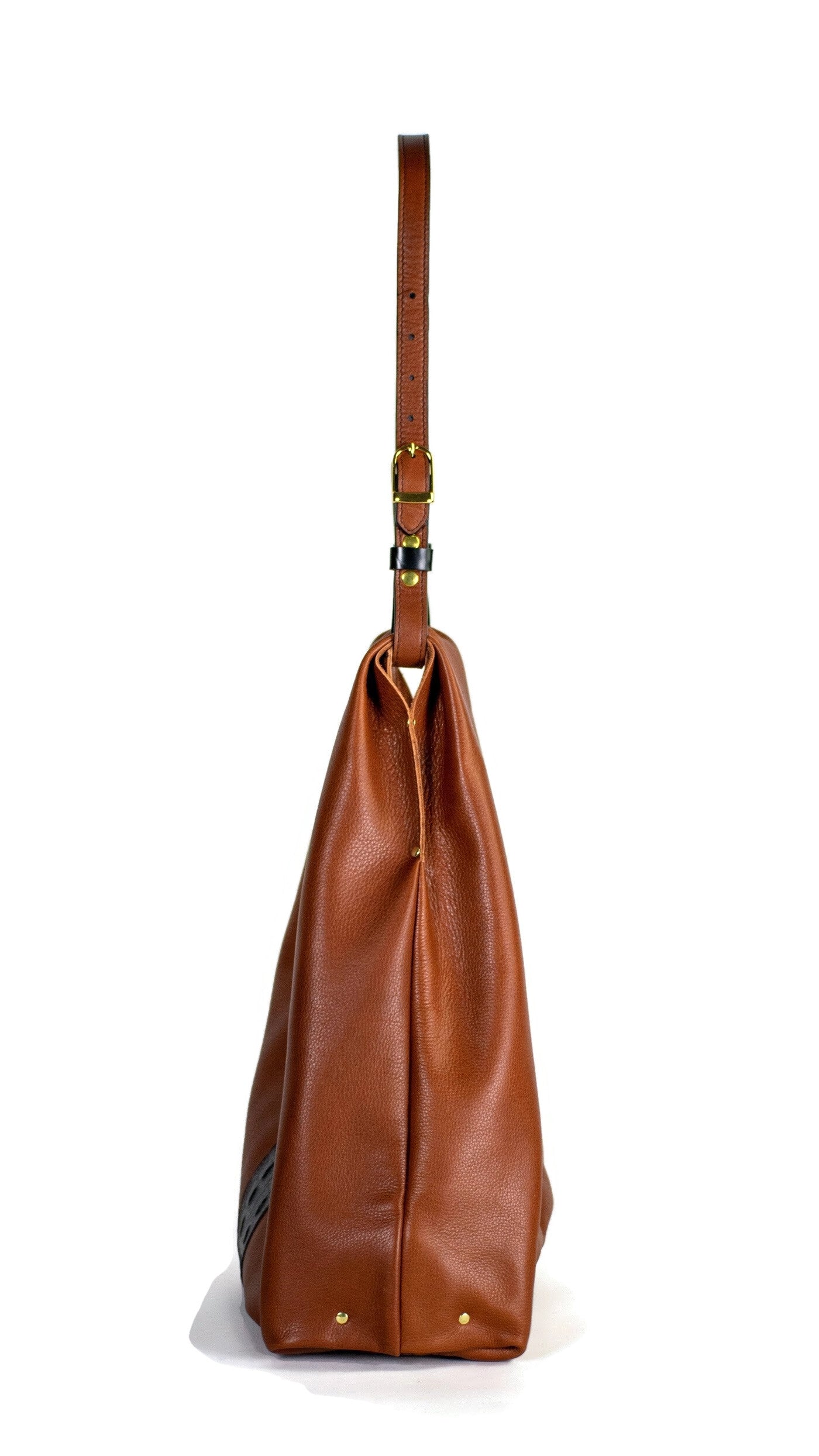 Side of Cognac brown leather hobo shoulder bag handcrafted in Italian calfskin by slow fashion indie designer Liv McClintock. Feature croc-embossed leather inlay. Made in Wilmington Delaware USA.